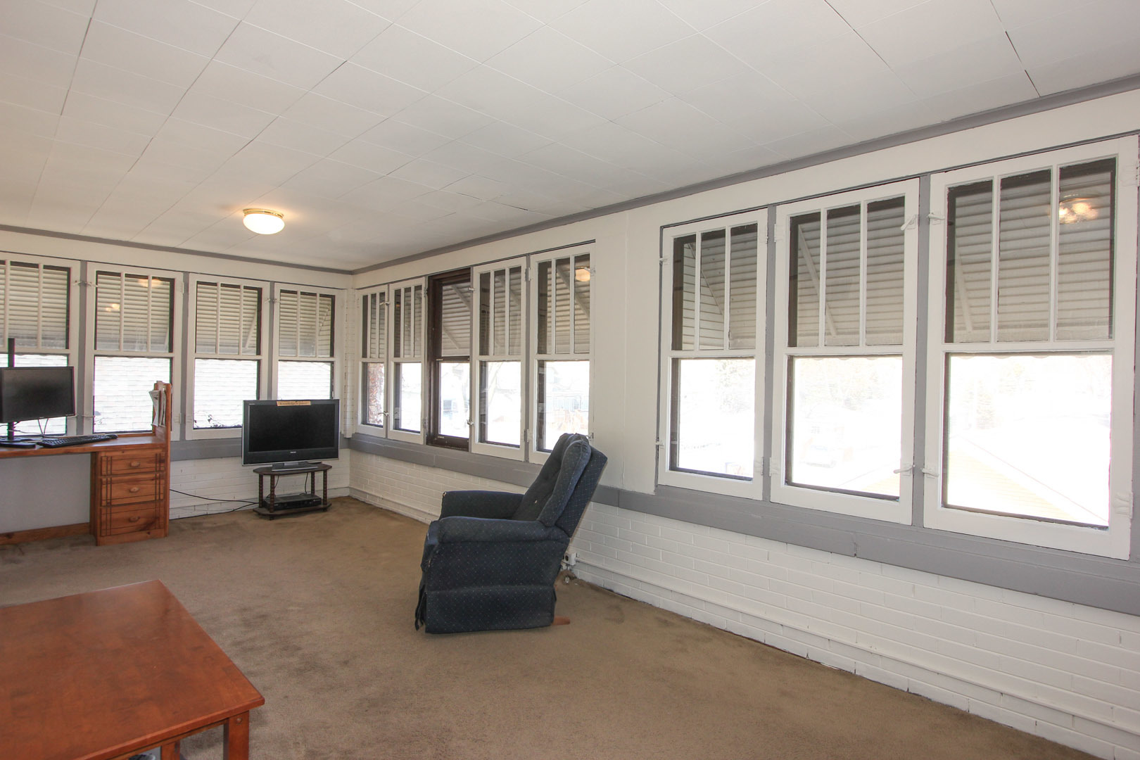 7610 Washington Boulevard River Forest, IL 60305 - Photo 21 of 30 a living room with furniture and large windows