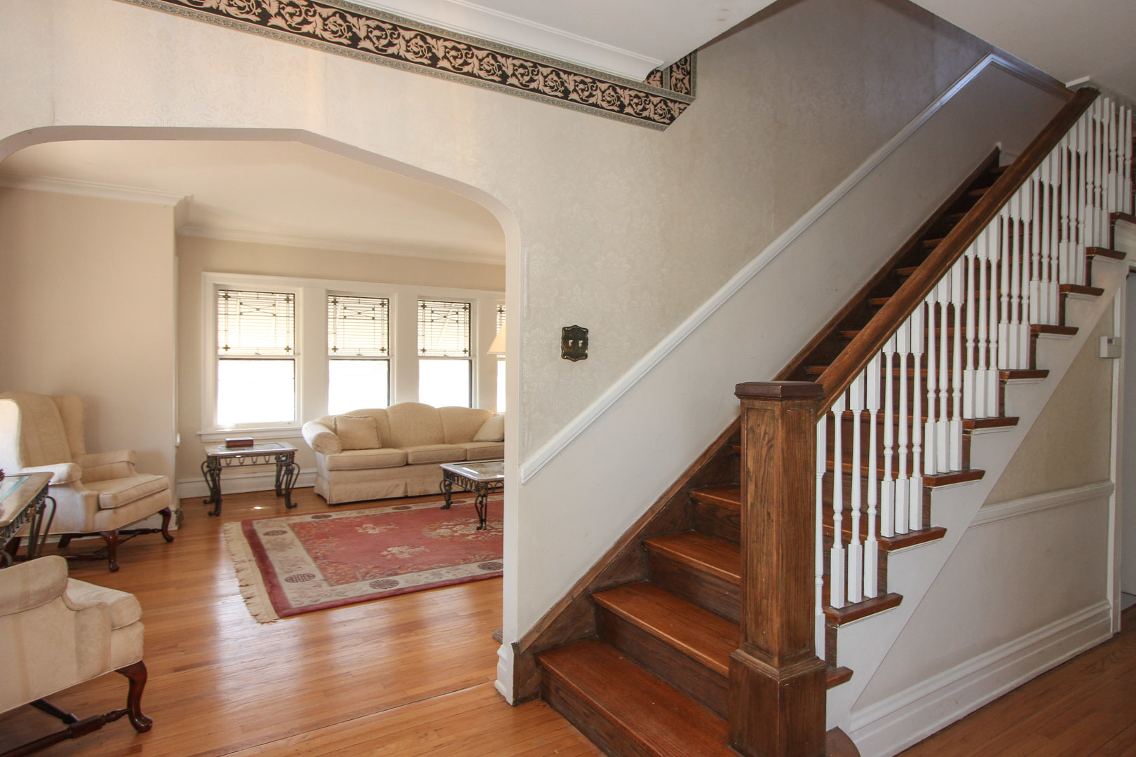 7610 Washington Boulevard River Forest, IL 60305 - Photo 4 of 30 a living room with wooden floor and furniture