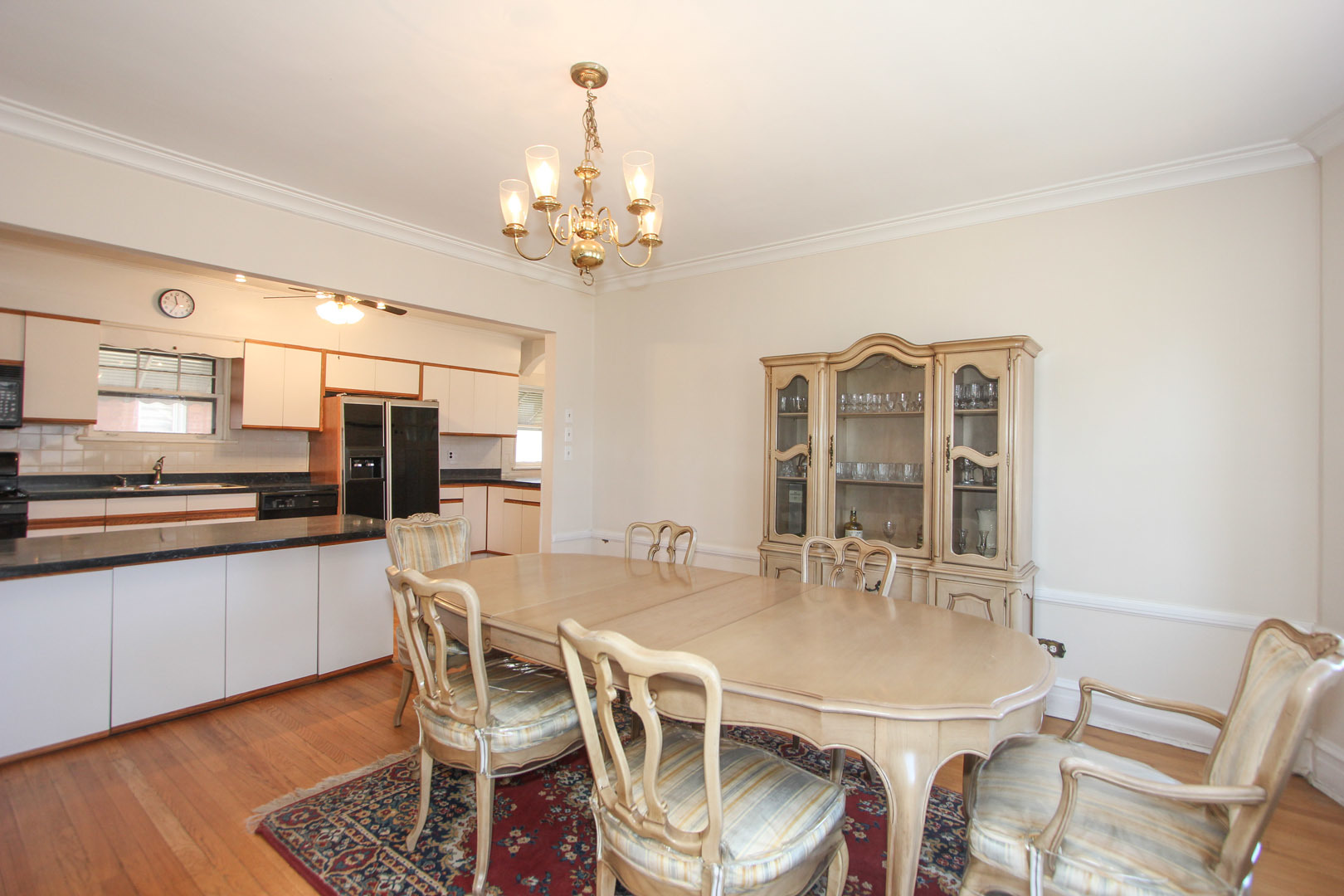 7610 Washington Boulevard River Forest, IL 60305 - Photo 5 of 30 a view of a dining room with furniture wooden floor and chandelier