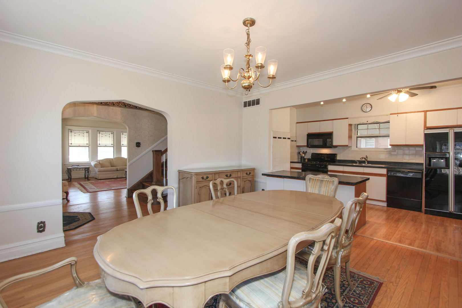 7610 Washington Boulevard River Forest, IL 60305 - Photo 6 of 30 a view of a dining room with furniture and chandelier
