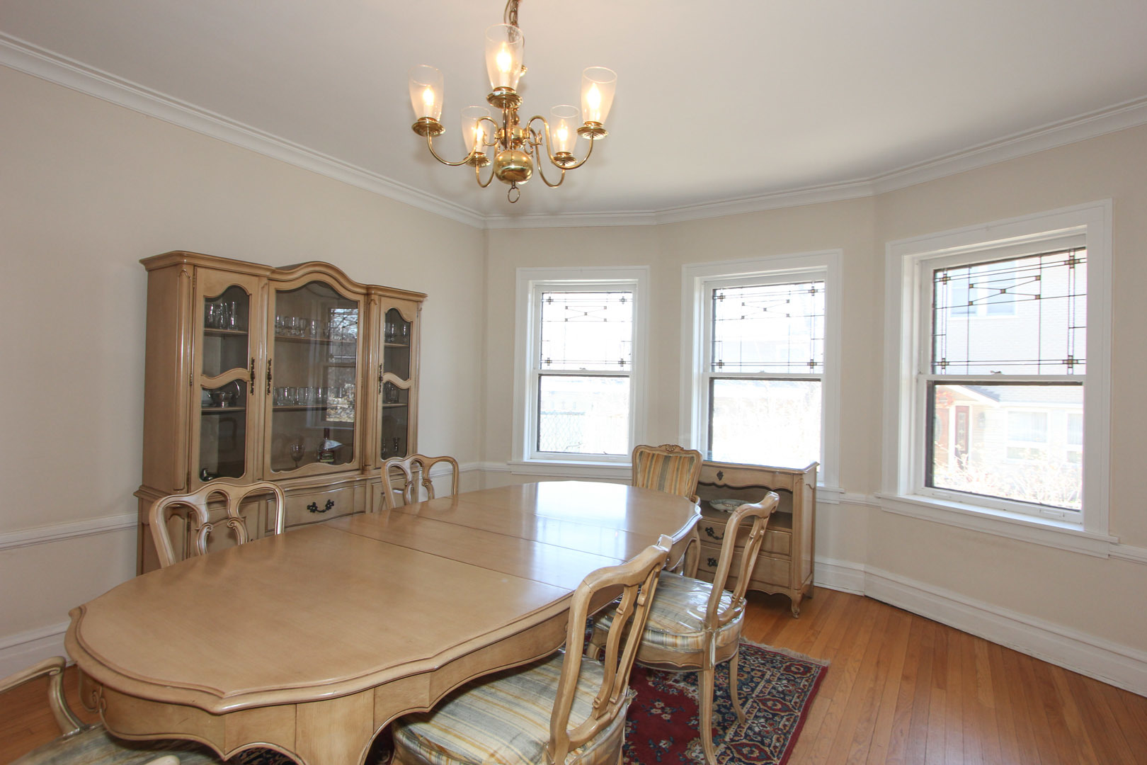 7610 Washington Boulevard River Forest, IL 60305 - Photo 7 of 30 a view of a dining room with furniture window and wooden floor