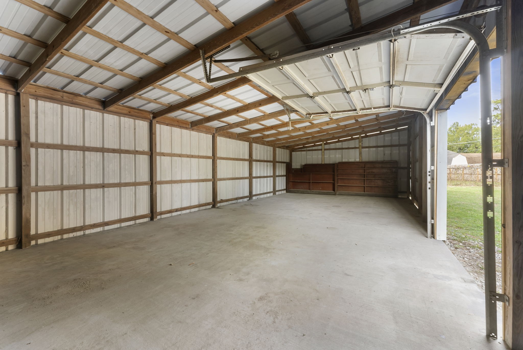 1635 Rayford Road Spring, TX 77386 - Photo 30 of 50 Large bay door for ease of getting large vehicles in and out.