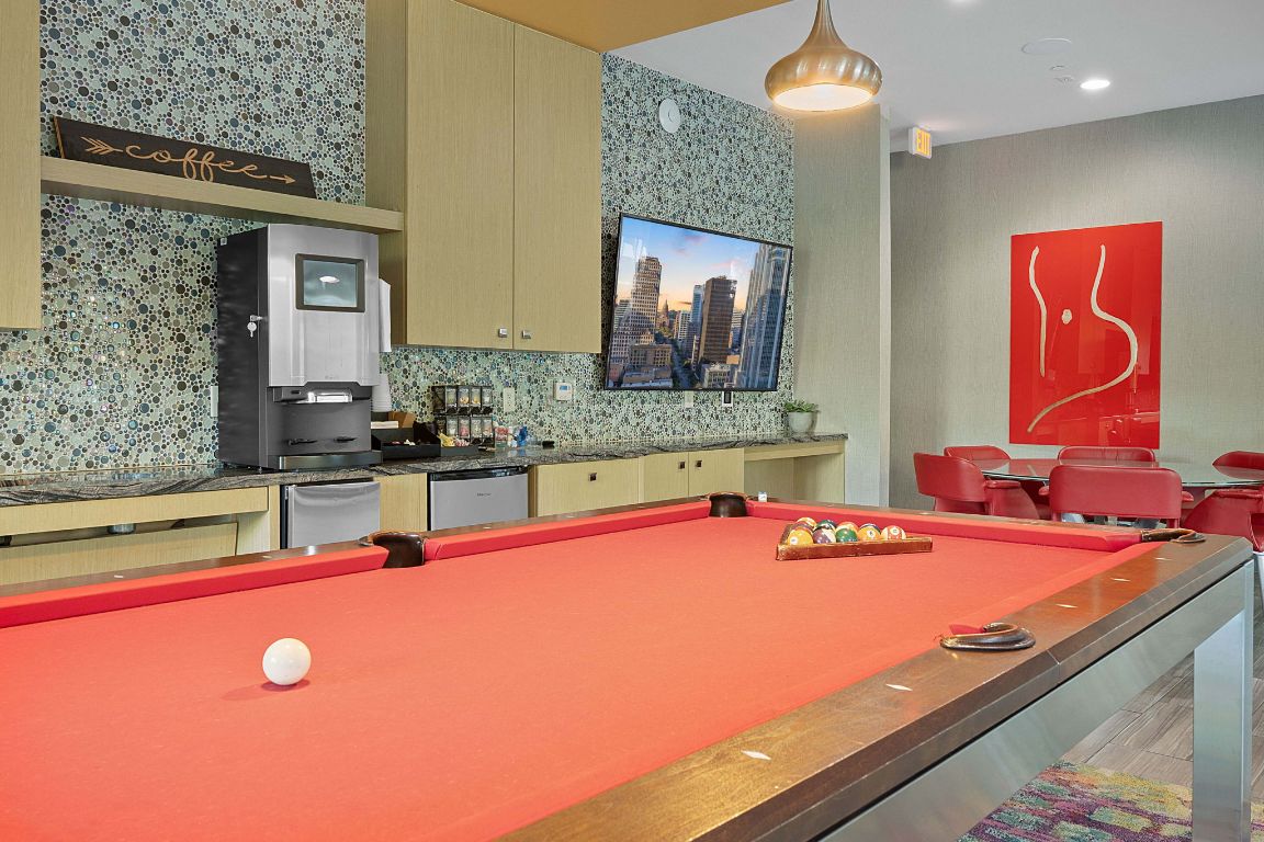 1900 Barton Springs Road, Unit 2019 Austin, TX 78704 - Photo 29 of 30 a kitchen with a sink and cabinets
