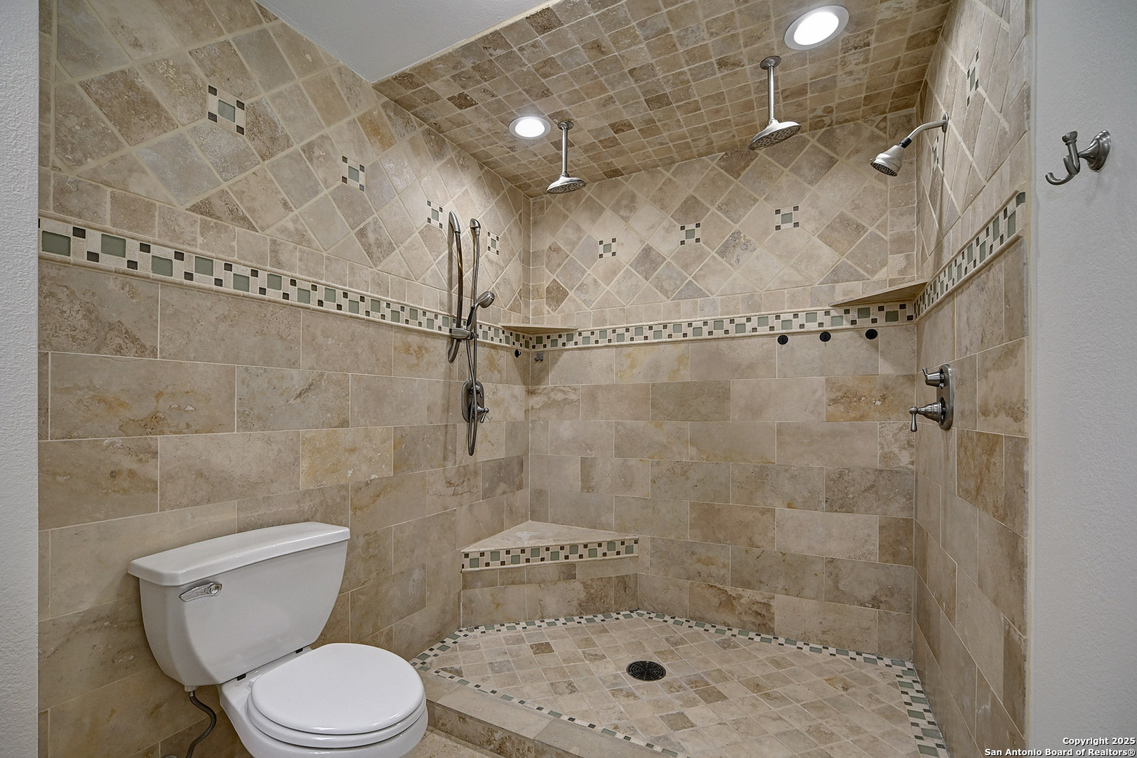 7543 Beaver Tree San Antonio, TX 78249 - Photo 18 of 38 a bathroom with a toilet and a shower