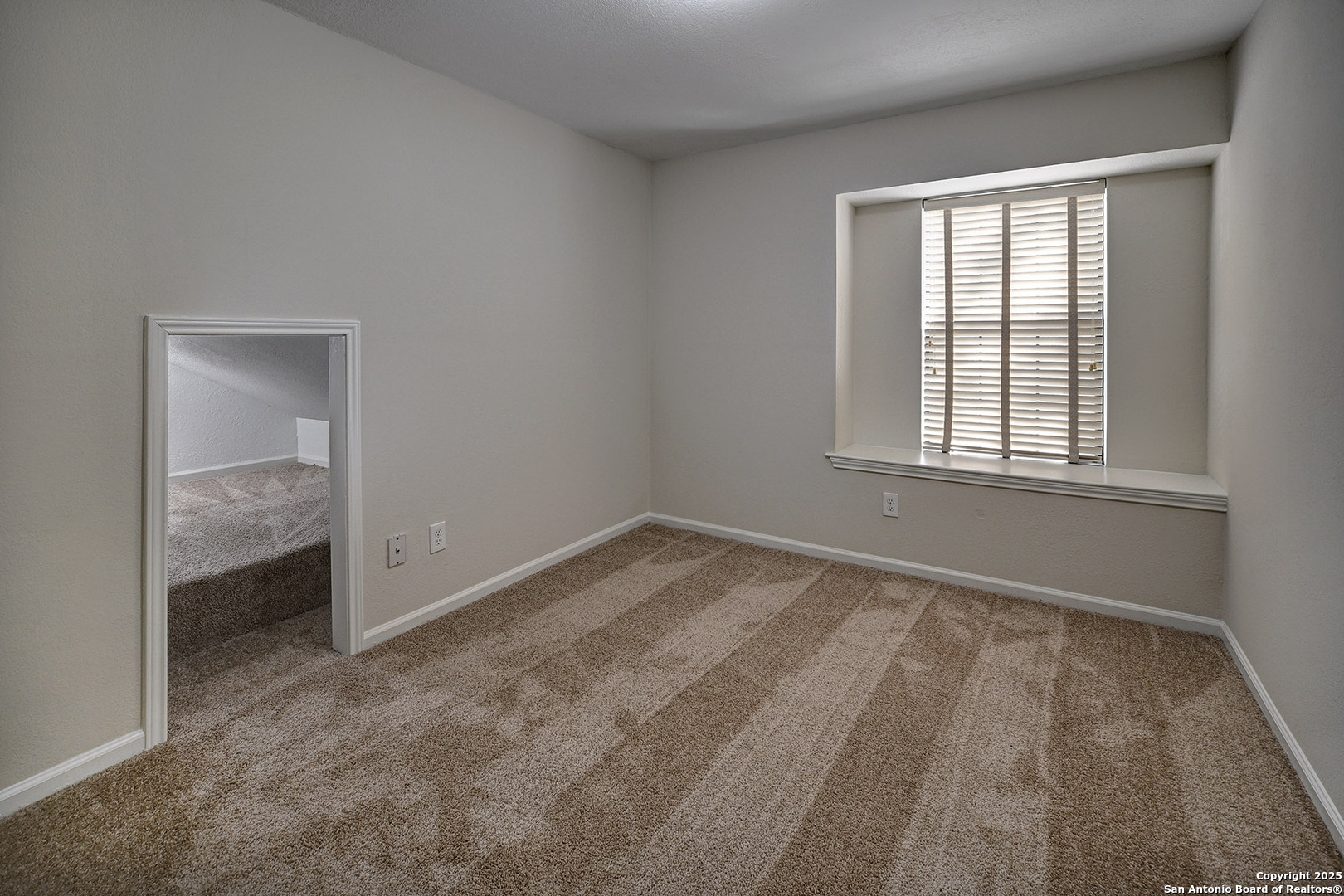 7543 Beaver Tree San Antonio, TX 78249 - Photo 31 of 38 an empty room with a window