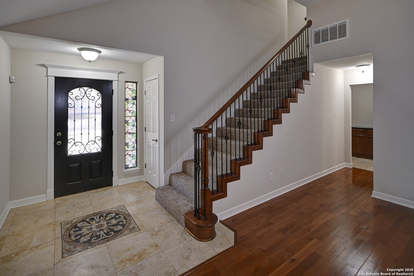 7543 Beaver Tree San Antonio, TX 78249 - Photo 6 of 38 a view of a hallway with wooden floor and entryway