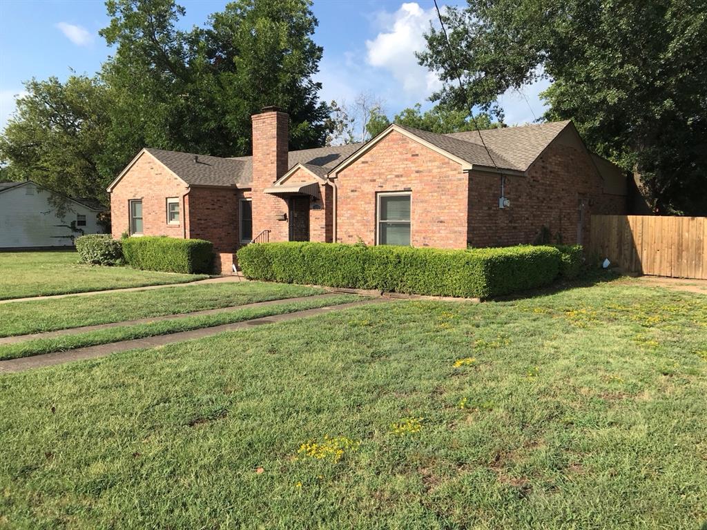 1824 North Binkley Street Sherman, TX 75092 - Photo 3 of 19 Ranch-style home featuring brick siding, a chimney, and roof with shingles