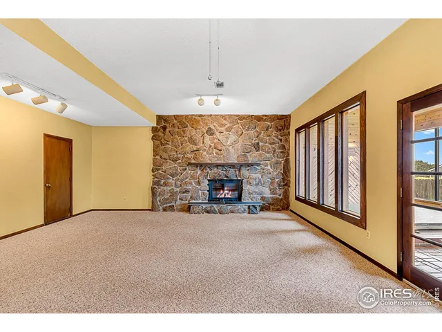 a view of empty room with windows