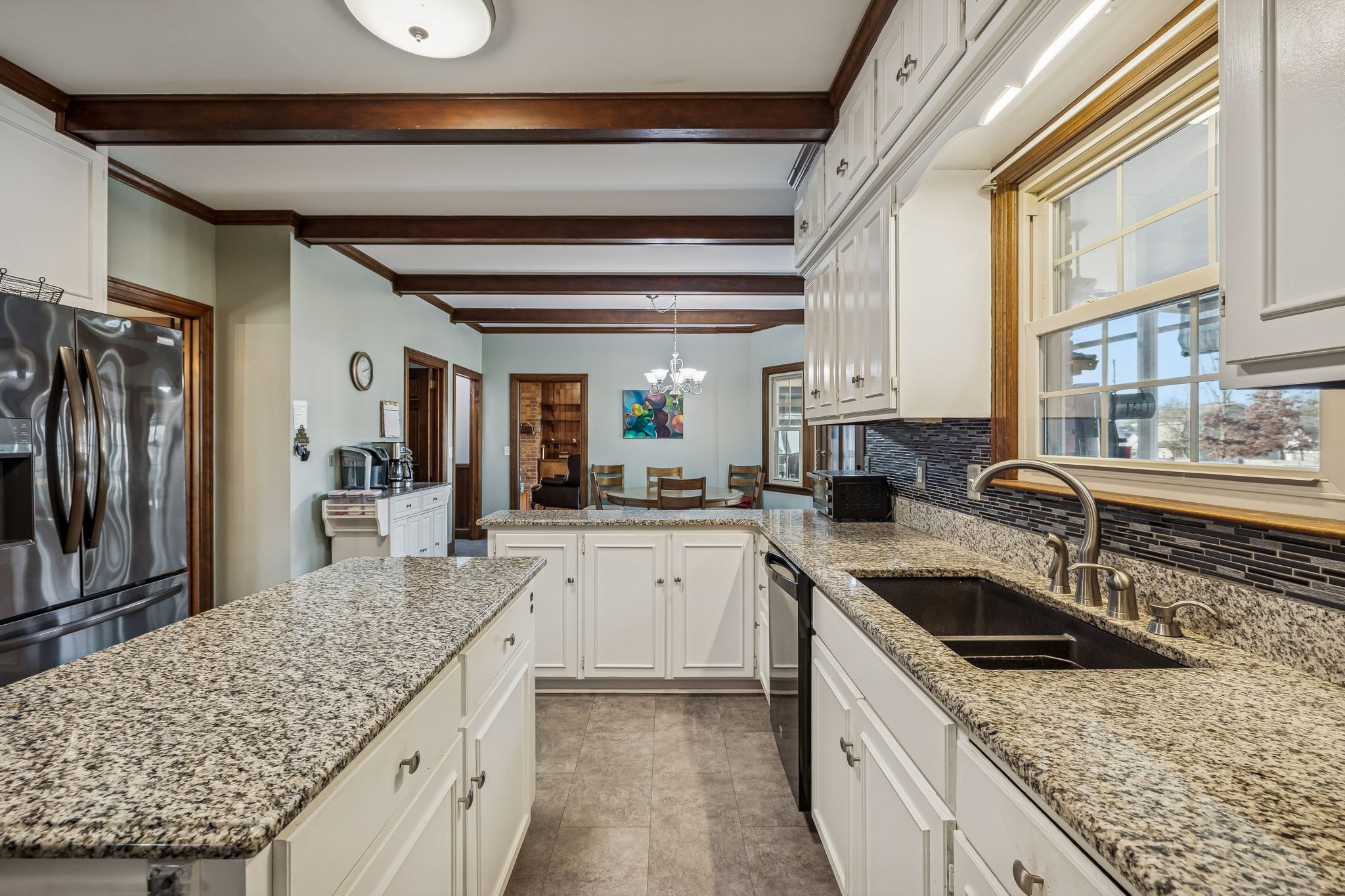 117 Sam Davis Drive Springfield, TN 37172 - Photo 14 of 42 a kitchen with stainless steel appliances granite countertop a sink stove and cabinets