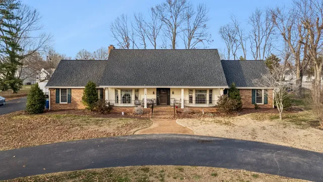 a view of house with outdoor space