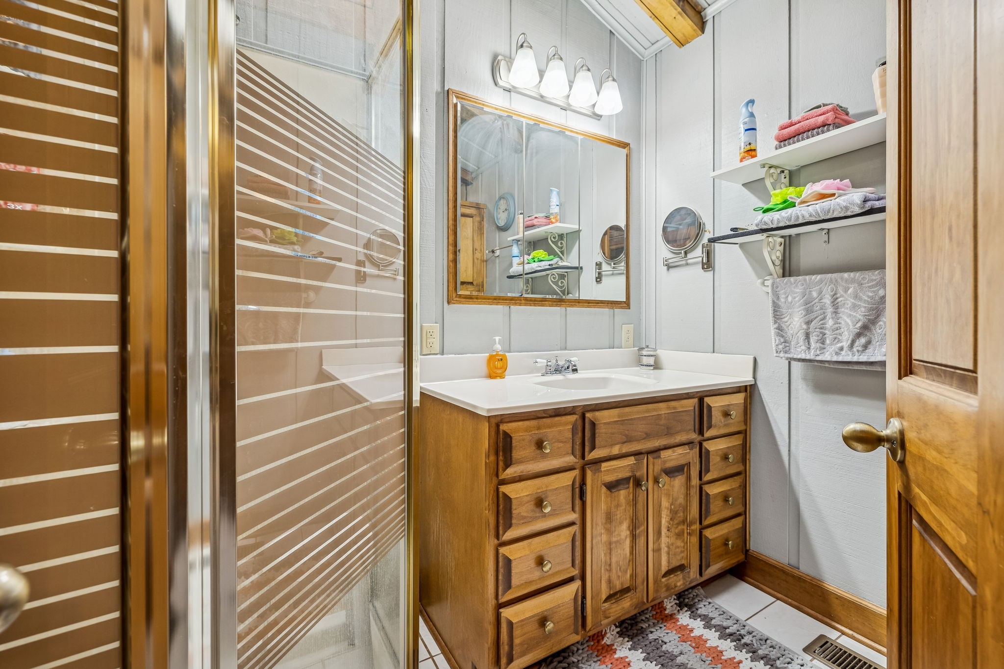 117 Sam Davis Drive Springfield, TN 37172 - Photo 24 of 44 a bathroom with sink shower and mirror