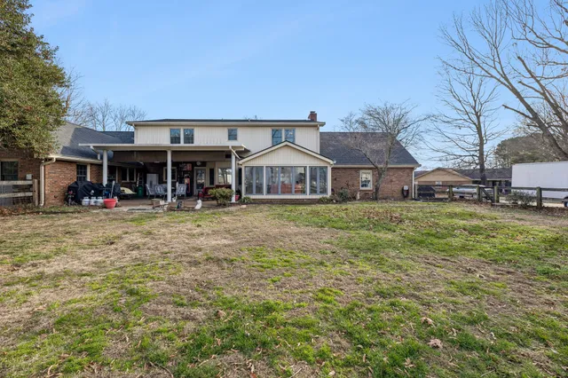 a front view of a building with garden