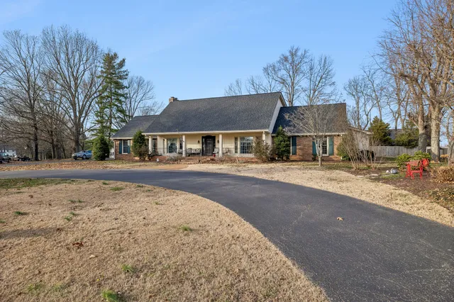 a view of house with a outdoor space