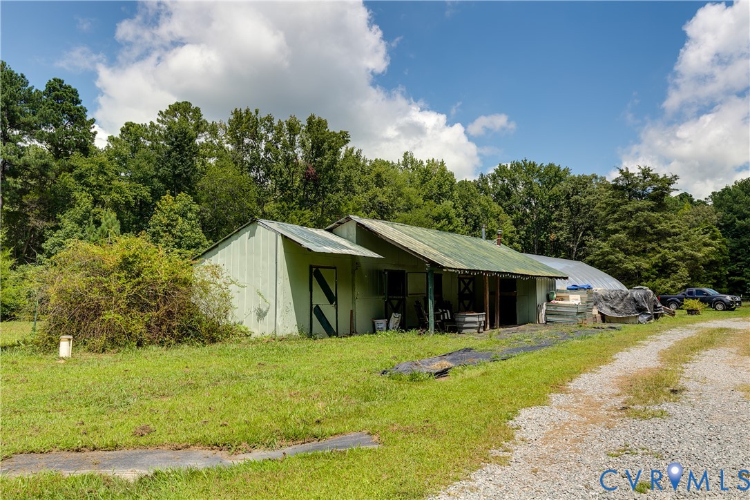 12778 Mt Hermon Road Ashland, VA 23005 - Photo 18 of 50 a front view of house with yard and green space