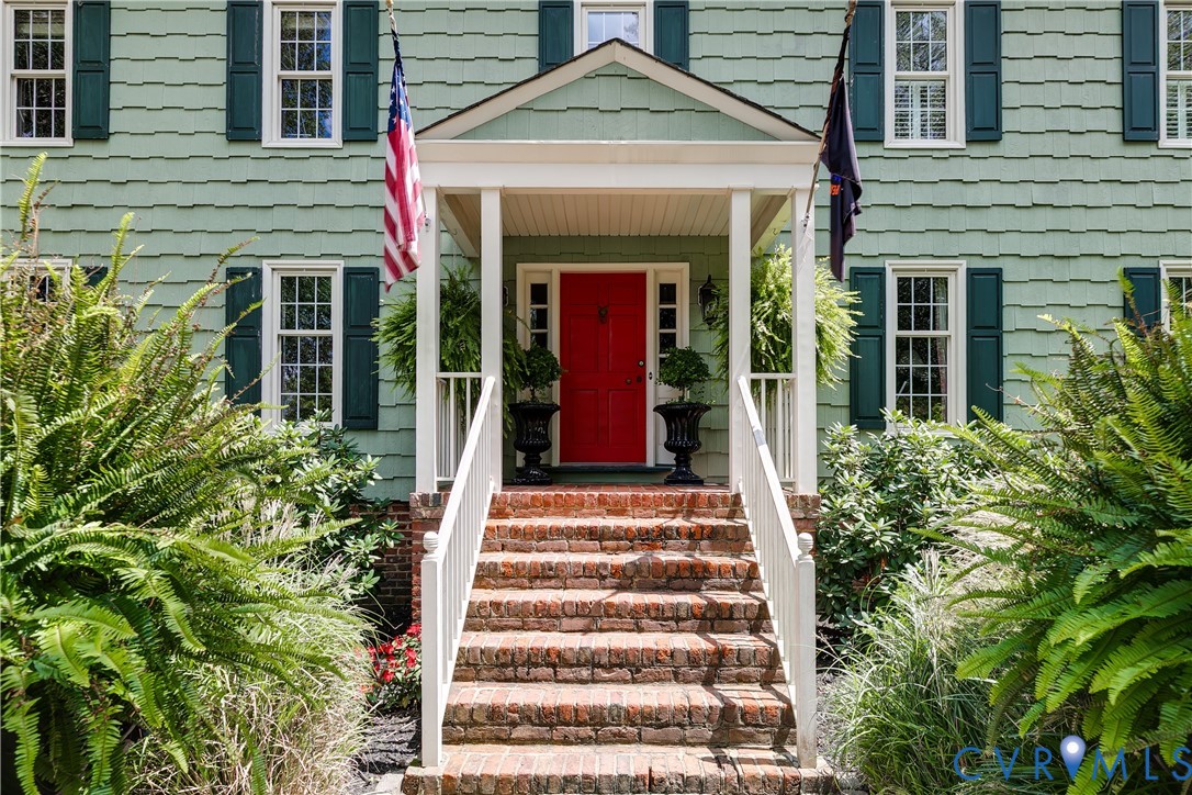 12778 Mt Hermon Road Ashland, VA 23005 - Photo 3 of 50 a front view of a house with potted plants