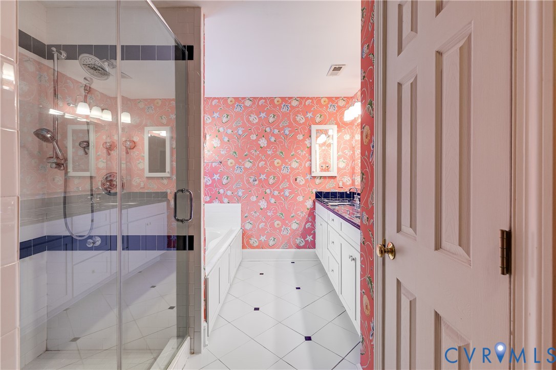 12778 Mt Hermon Road Ashland, VA 23005 - Photo 41 of 50 a bathroom with a bathtub and shower