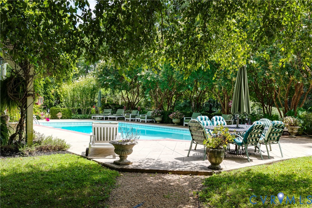 12778 Mt Hermon Road Ashland, VA 23005 - Photo 8 of 50 a view of a swimming pool with sitting area and garden