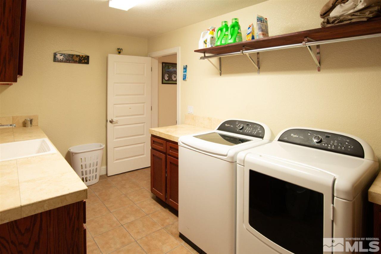 4767 Rancheria Road Fallon, NV 89406 - Photo 17 of 25 a utility room with dryer and washer