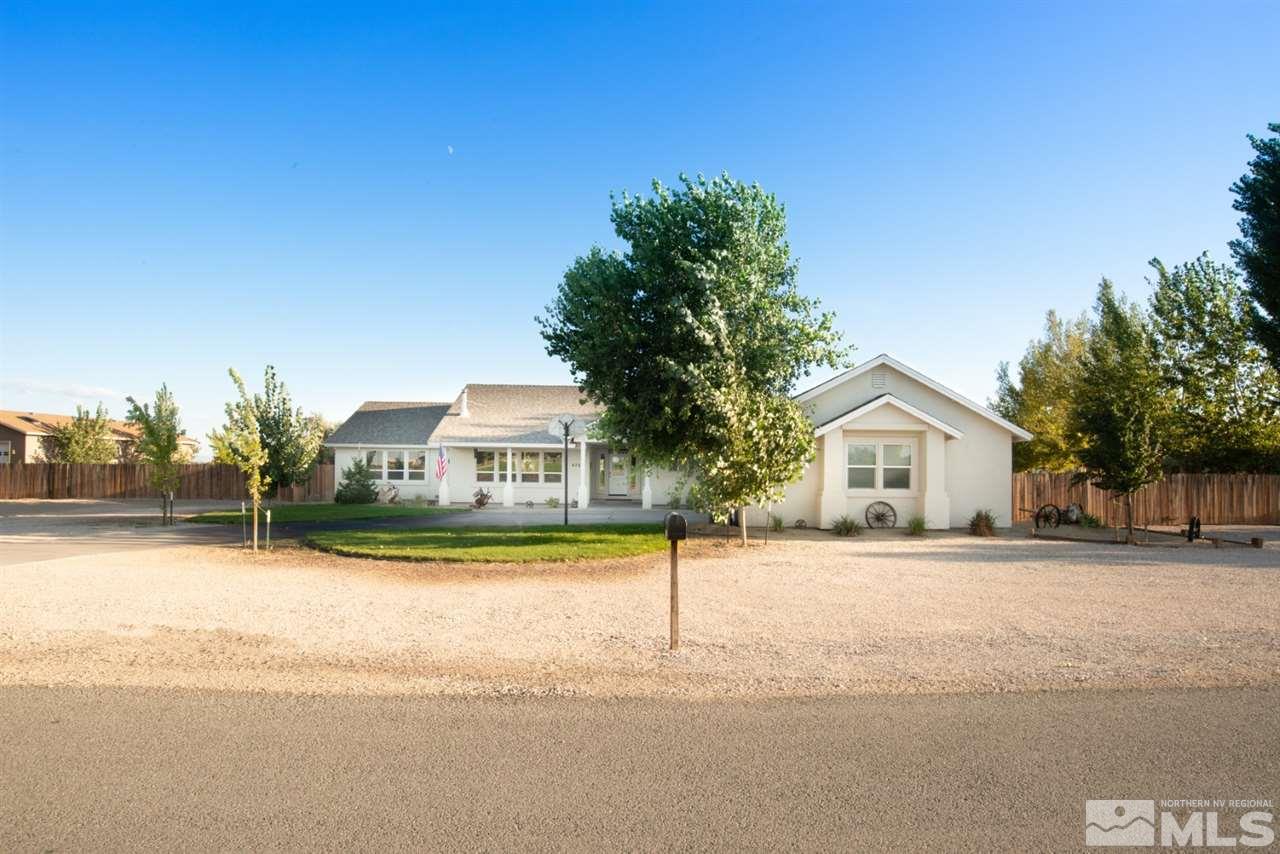 4767 Rancheria Road Fallon, NV 89406 - Photo 2 of 25 a view of a house with a yard