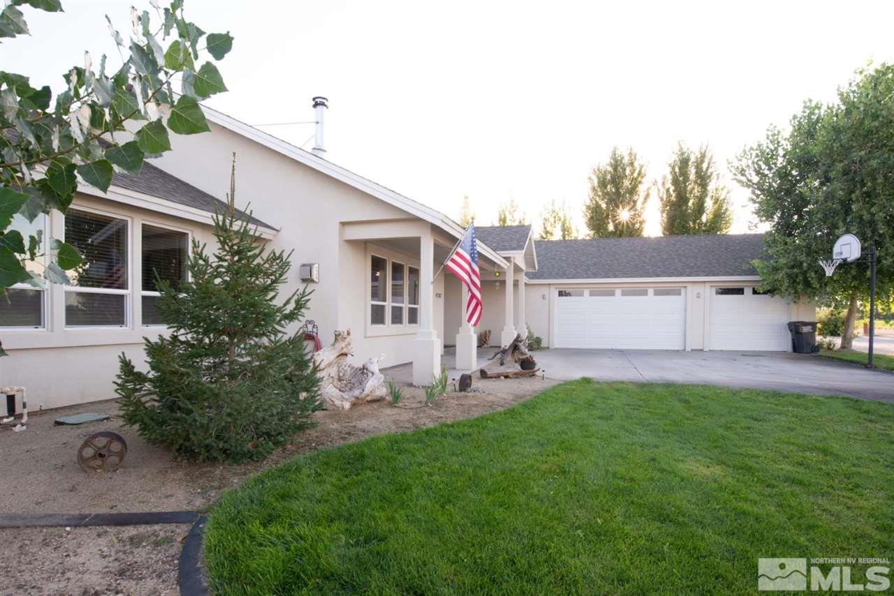 4767 Rancheria Road Fallon, NV 89406 - Photo 3 of 25 a view of a house with a yard and sitting area