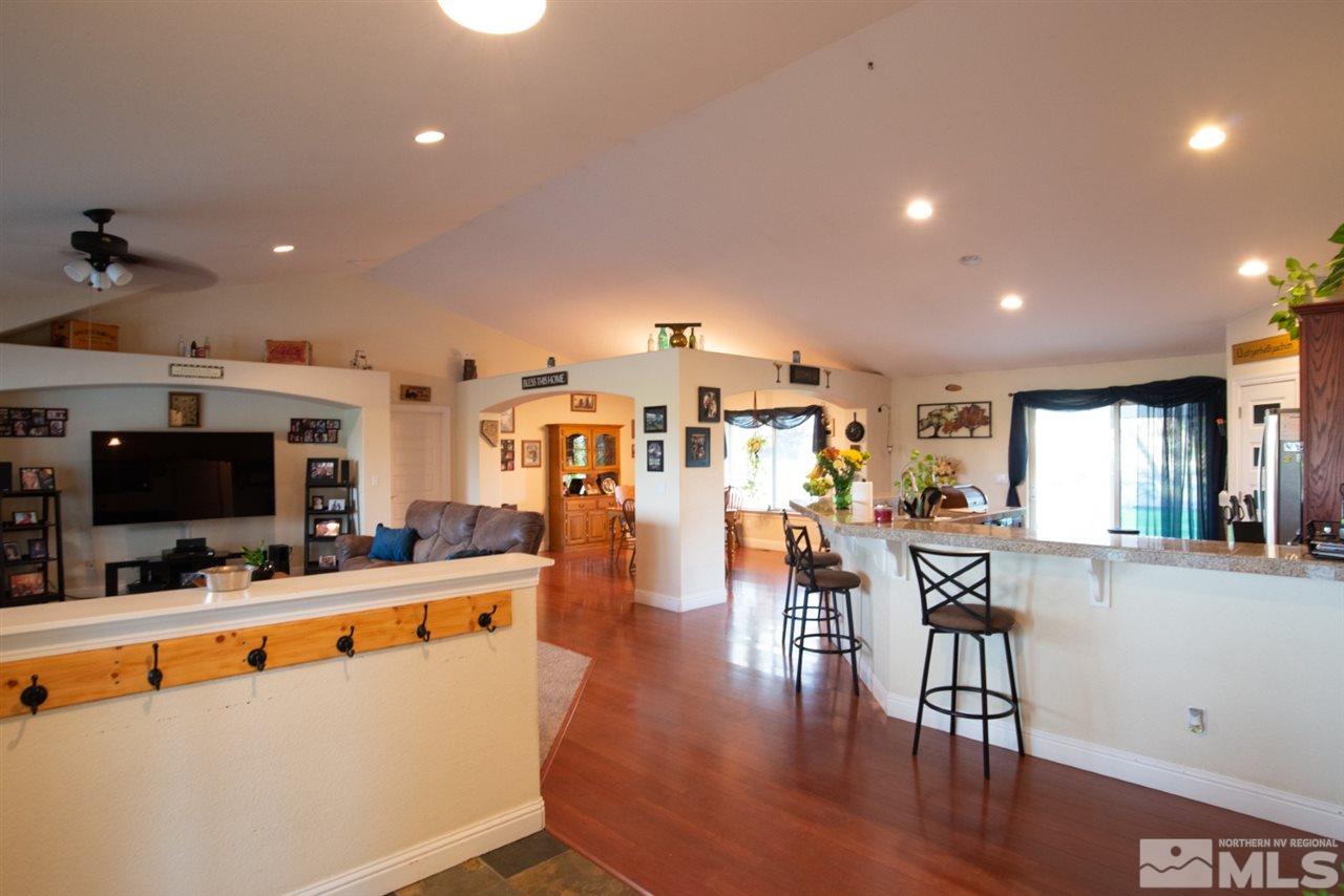 4767 Rancheria Road Fallon, NV 89406 - Photo 4 of 25 a dining room with furniture and wooden floor
