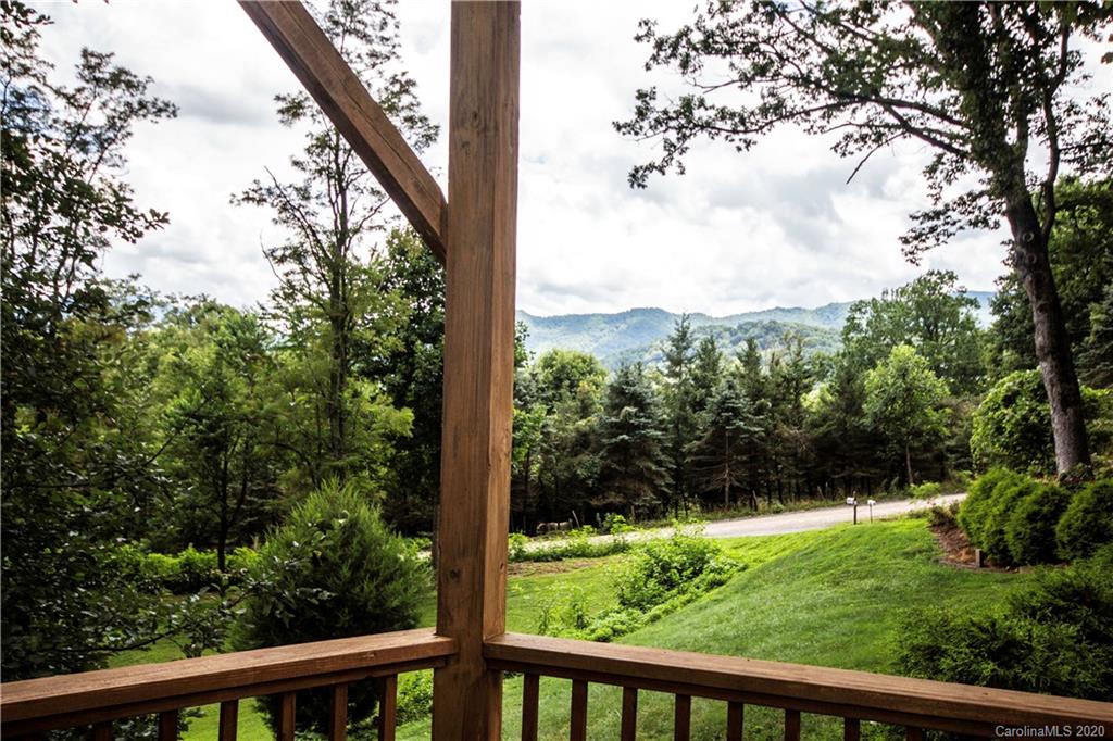 260 Plott Valley Road Waynesville, NC 28786 - Photo 22 of 26 a view of a garden from a balcony