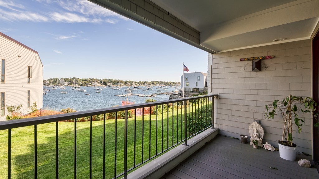 a view of balcony with furniture
