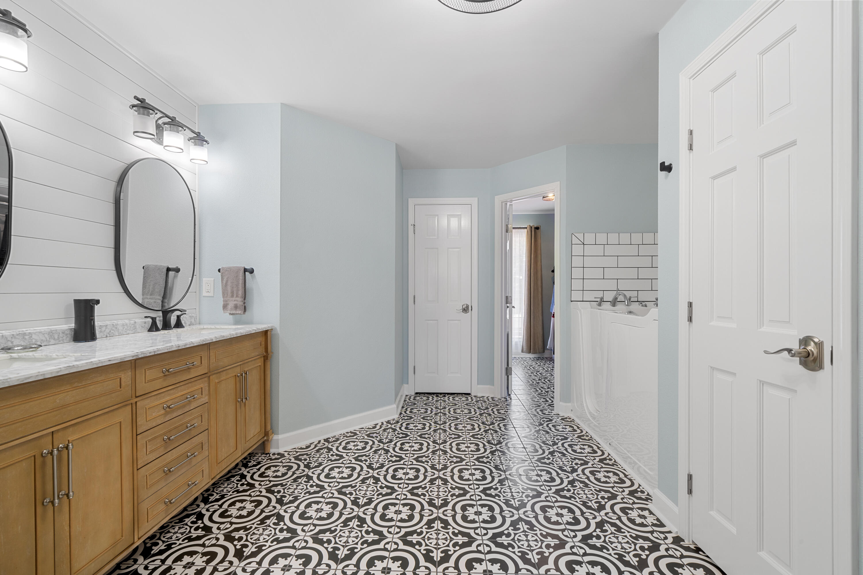 1933 Eagle Lane Navarre, FL 32566 - Photo 29 of 40 a bathroom with a sink and a mirror