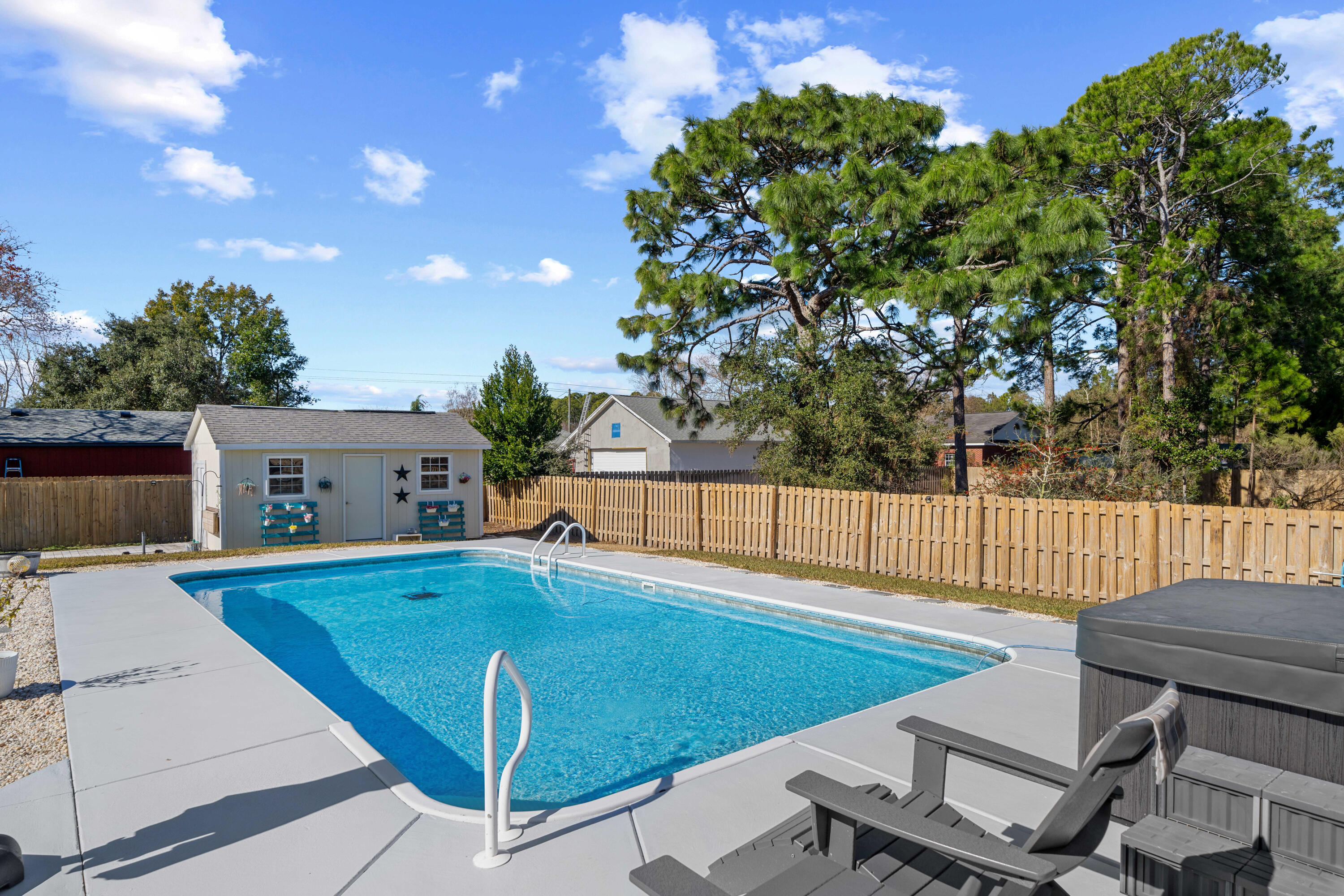 1933 Eagle Lane Navarre, FL 32566 - Photo 4 of 40 a view of a chairs and table in the patio