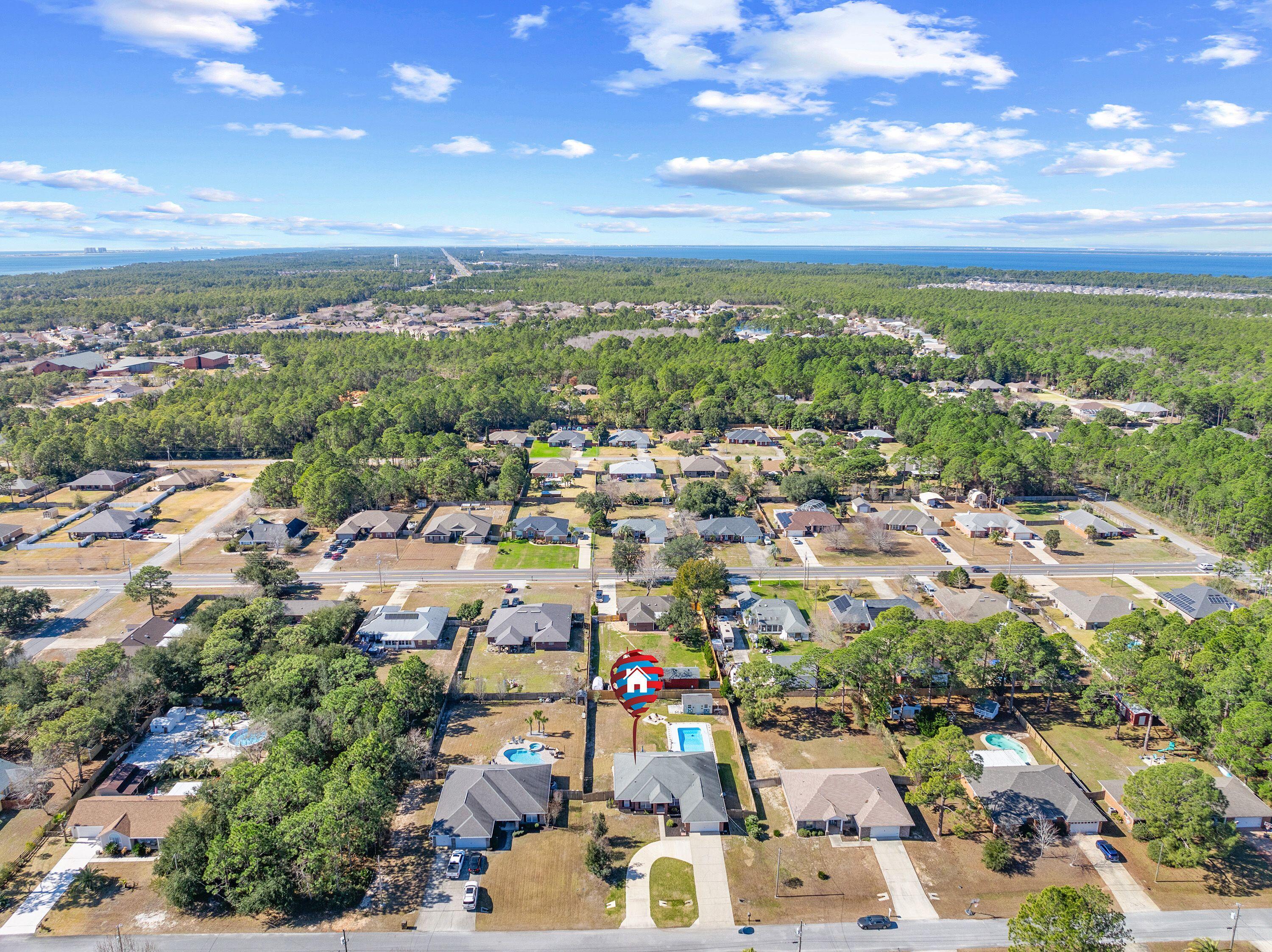 1933 Eagle Lane Navarre, FL 32566 - Photo 7 of 40 an aerial view of a city