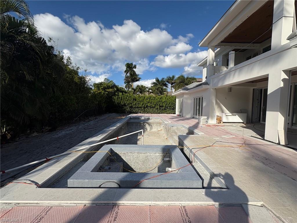 1985 Crayton Road Naples, FL 34102 - Photo 3 of 8 a view of outdoor space with seating