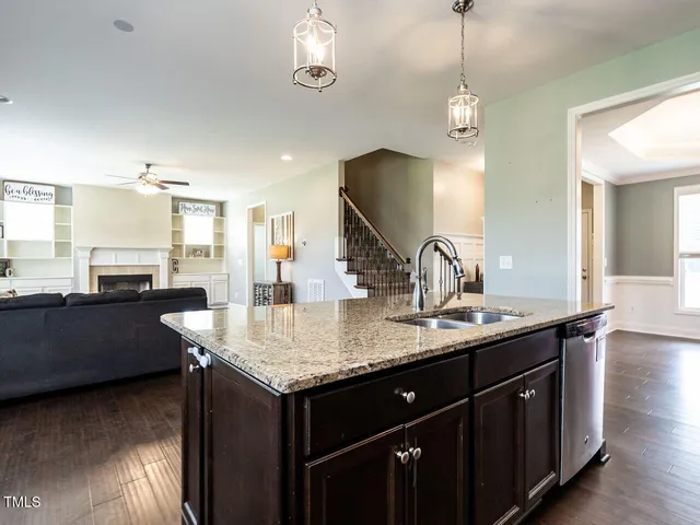 a kitchen with counter top space and a sink