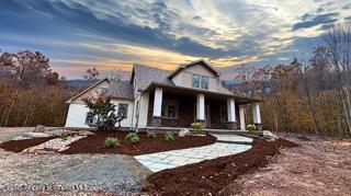 434 Summit Woods Road Moscow, PA 18444 - Photo 17 of 19 a front view of a house