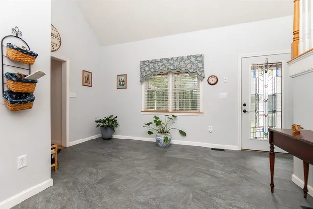 a view of livingroom with furniture and windows