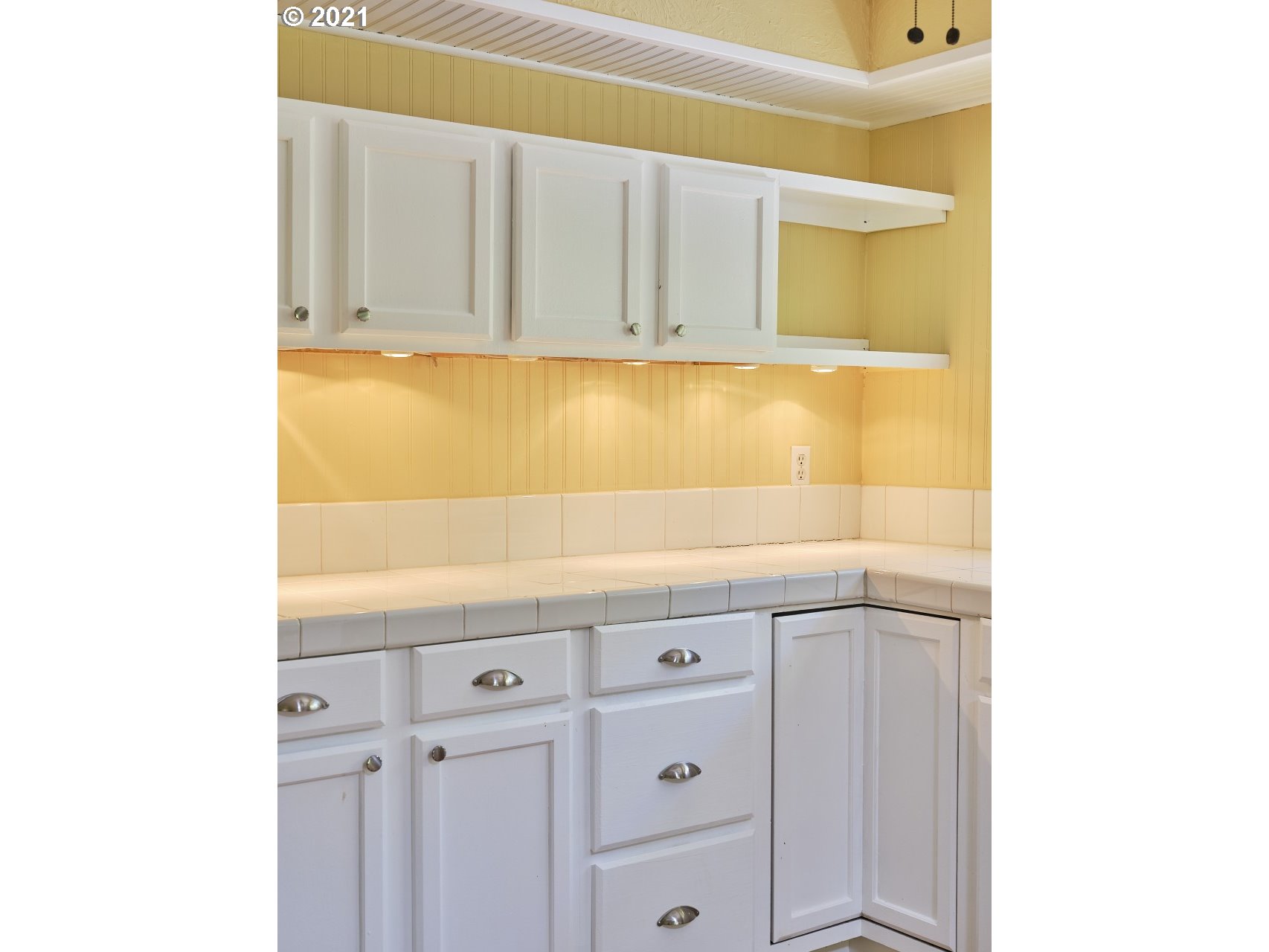 6121 Northeast Lessard Road Camas, WA 98607 - Photo 11 of 26 a kitchen with white cabinets and sink