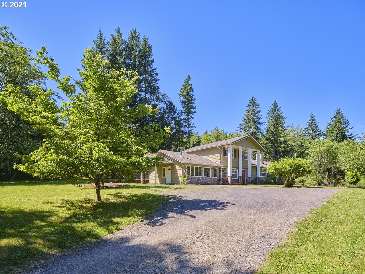 6121 Northeast Lessard Road Camas, WA 98607 - Photo 3 of 26 a front view of a house with a yard