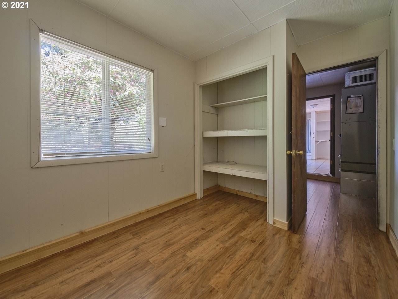 6121 Northeast Lessard Road Camas, WA 98607 - Photo 24 of 26 a view of a room with wooden floor and a window