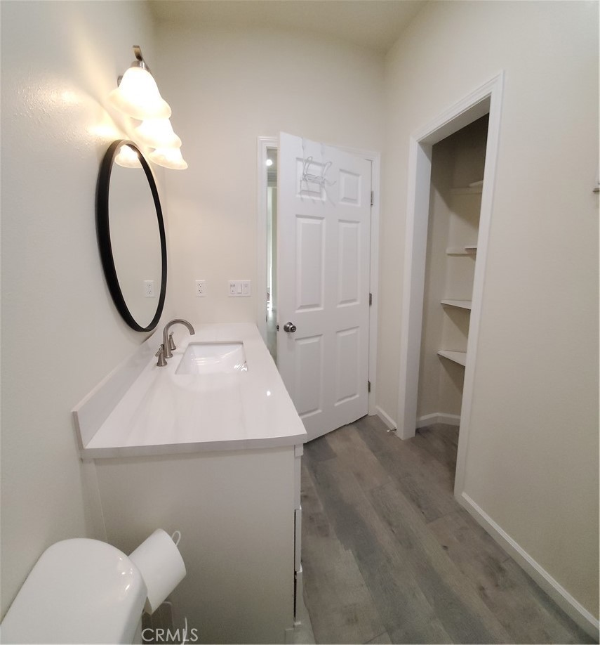 6282 Hartnell Court Magalia, CA 95954 - Photo 20 of 33 a bathroom with a sink mirror and toilet