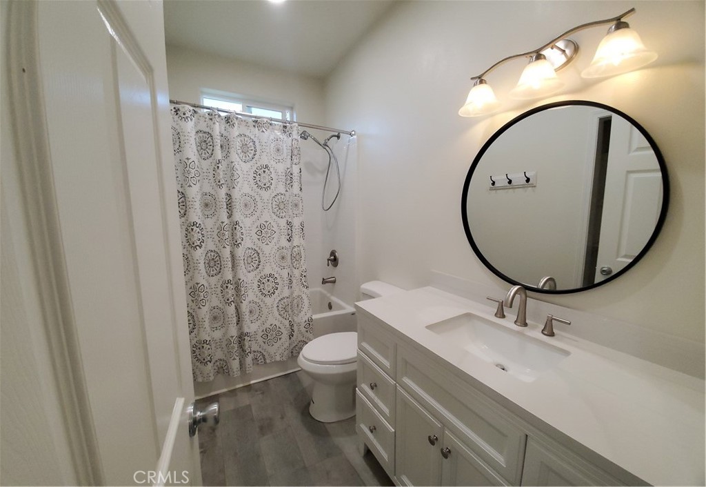 6282 Hartnell Court Magalia, CA 95954 - Photo 21 of 33 a bathroom with a toilet sink and mirror