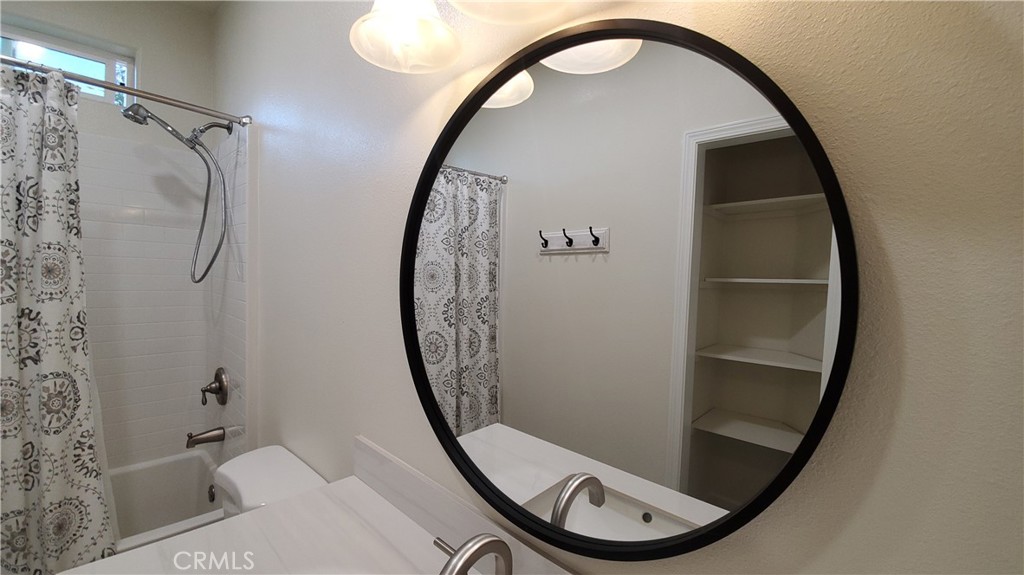 6282 Hartnell Court Magalia, CA 95954 - Photo 22 of 33 a view of a mirror in a bathroom