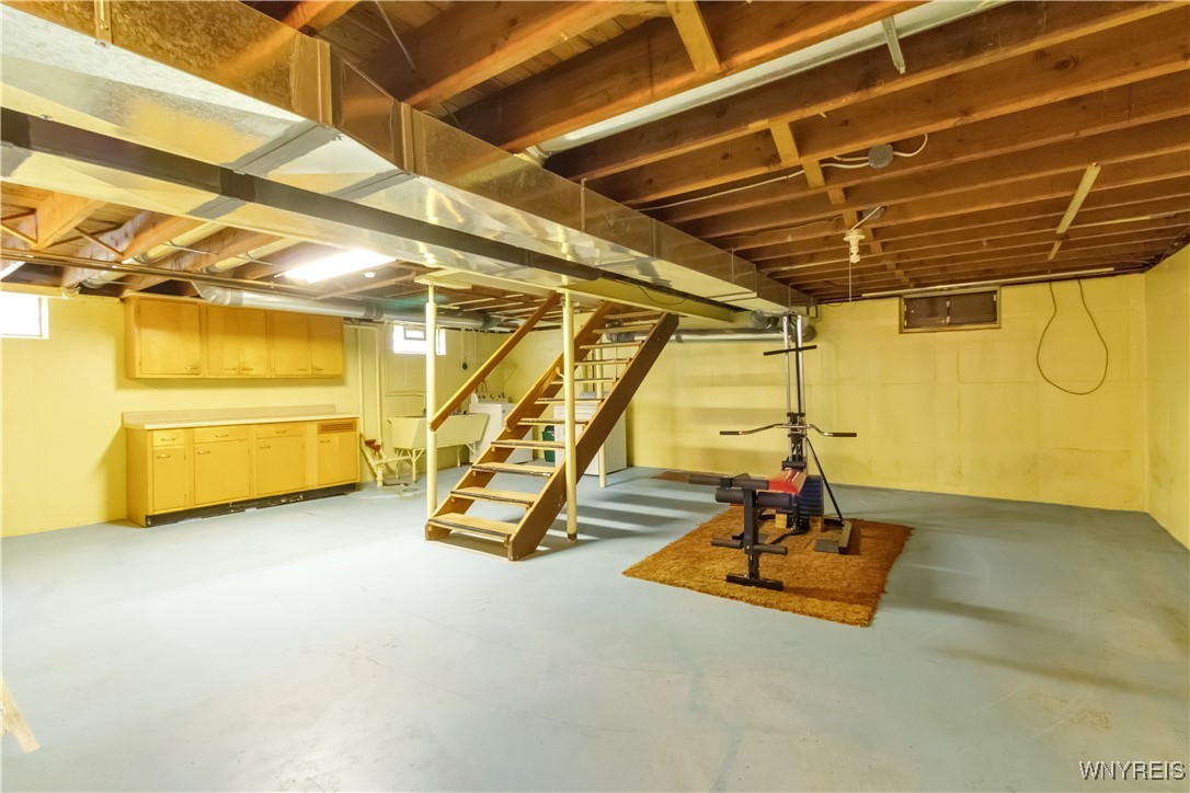 303 Seneca Place Lancaster, NY 14086 - Photo 23 of 31 Full Basement with washer & dryer area