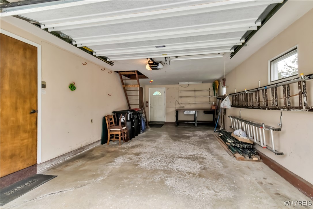 303 Seneca Place Lancaster, NY 14086 - Photo 28 of 31 Garage has pull down stairs to attic