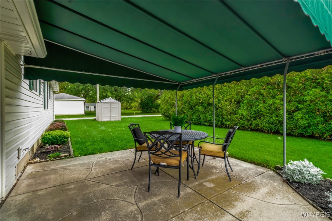 303 Seneca Place Lancaster, NY 14086 - Photo 30 of 31 Patio with awning