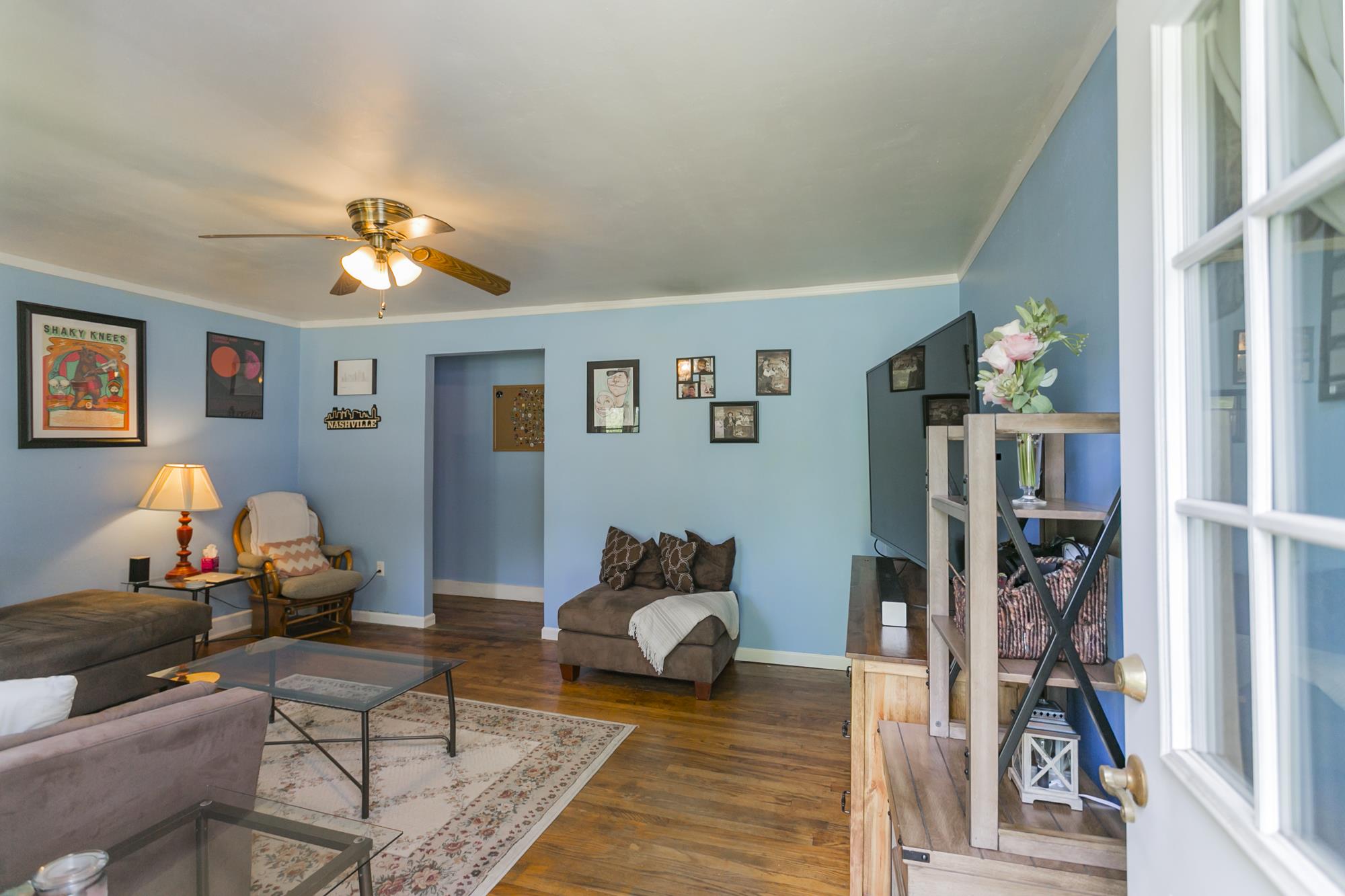 108 North Street Portland, TN 37148 - Photo 3 of 21 a living room with furniture chess board and a ceiling fan