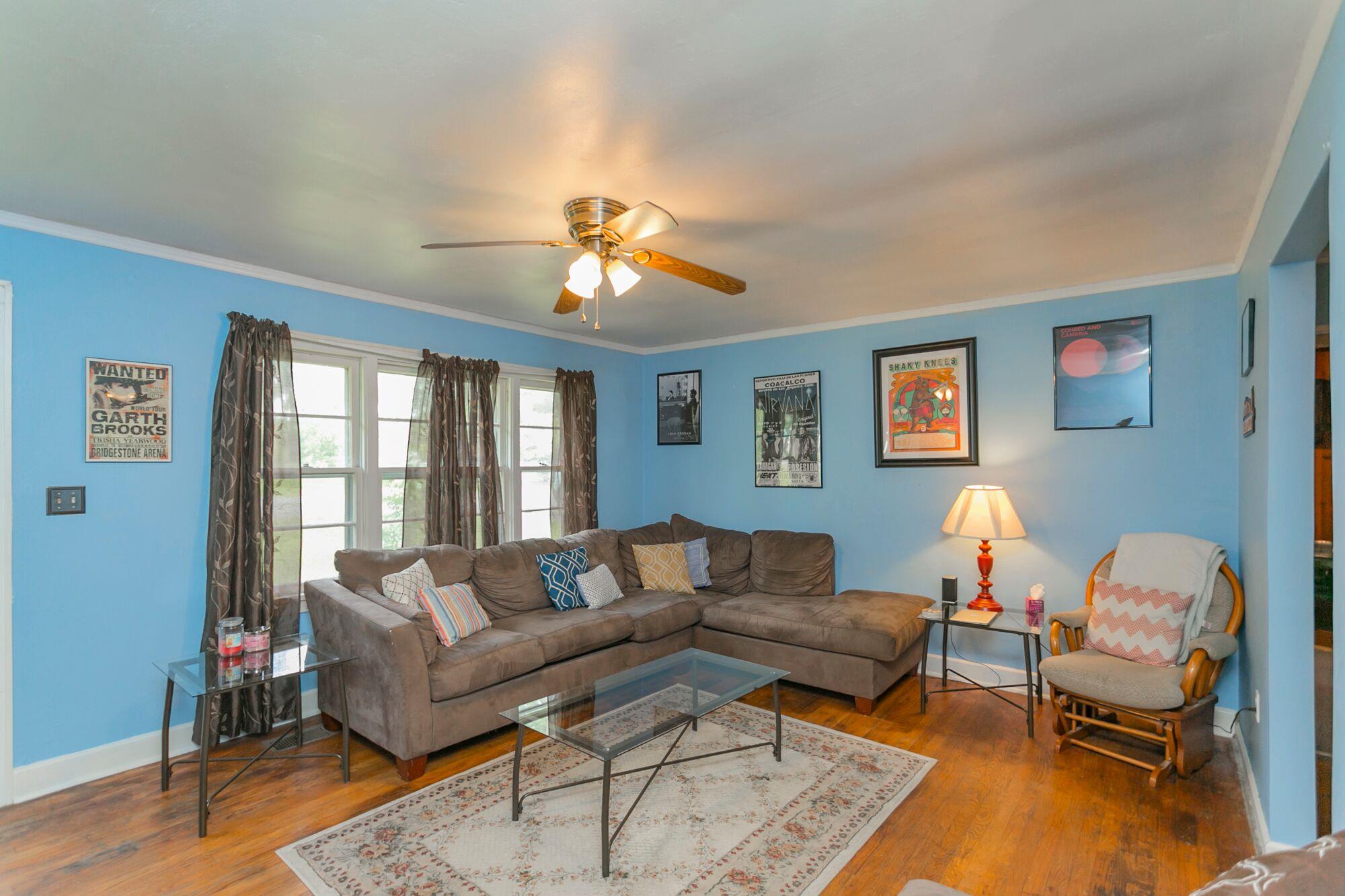 108 North Street Portland, TN 37148 - Photo 4 of 21 a living room with furniture a lamp and a window