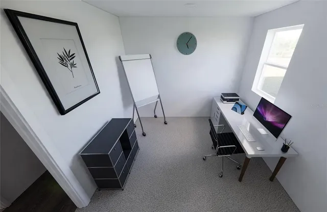 a view of an entryway with a workspace