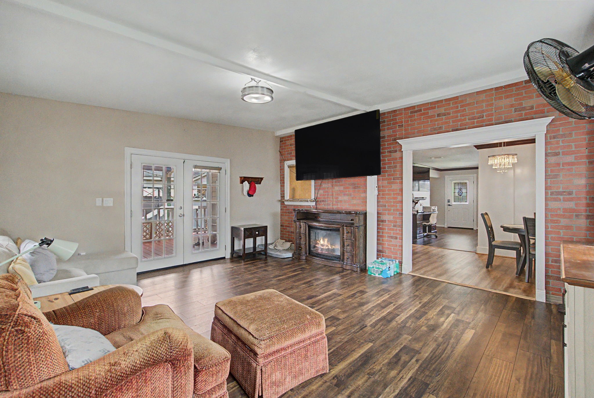 10034 Alfred Lane Houston, TX 77041 - Photo 24 of 50 Gather around the fireplace and enjoy a space designed for comfort, conversation, and connection.