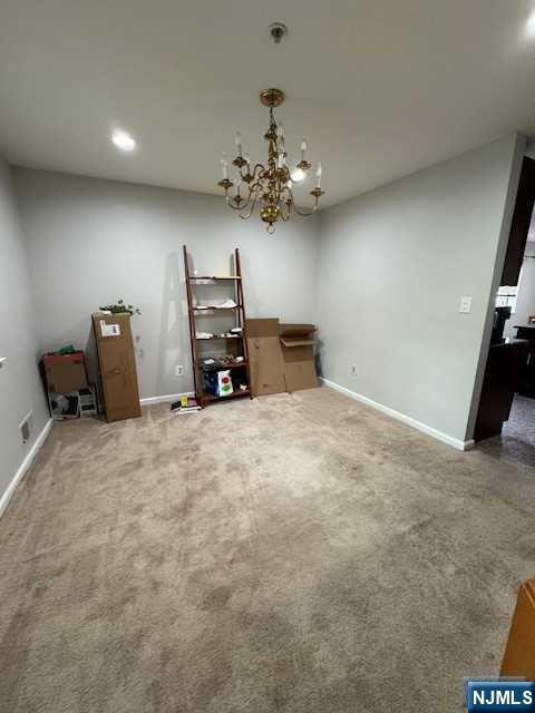 1209 Faulkner Court Mahwah, NJ 07430 - Photo 8 of 11 a view of a livingroom with a chandelier furniture and a chandelier