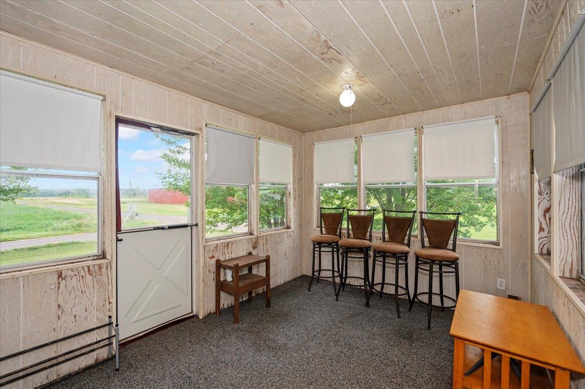 2397 Peterson Road Poplar, WI 54864 - Photo 14 of 26 Sun Room