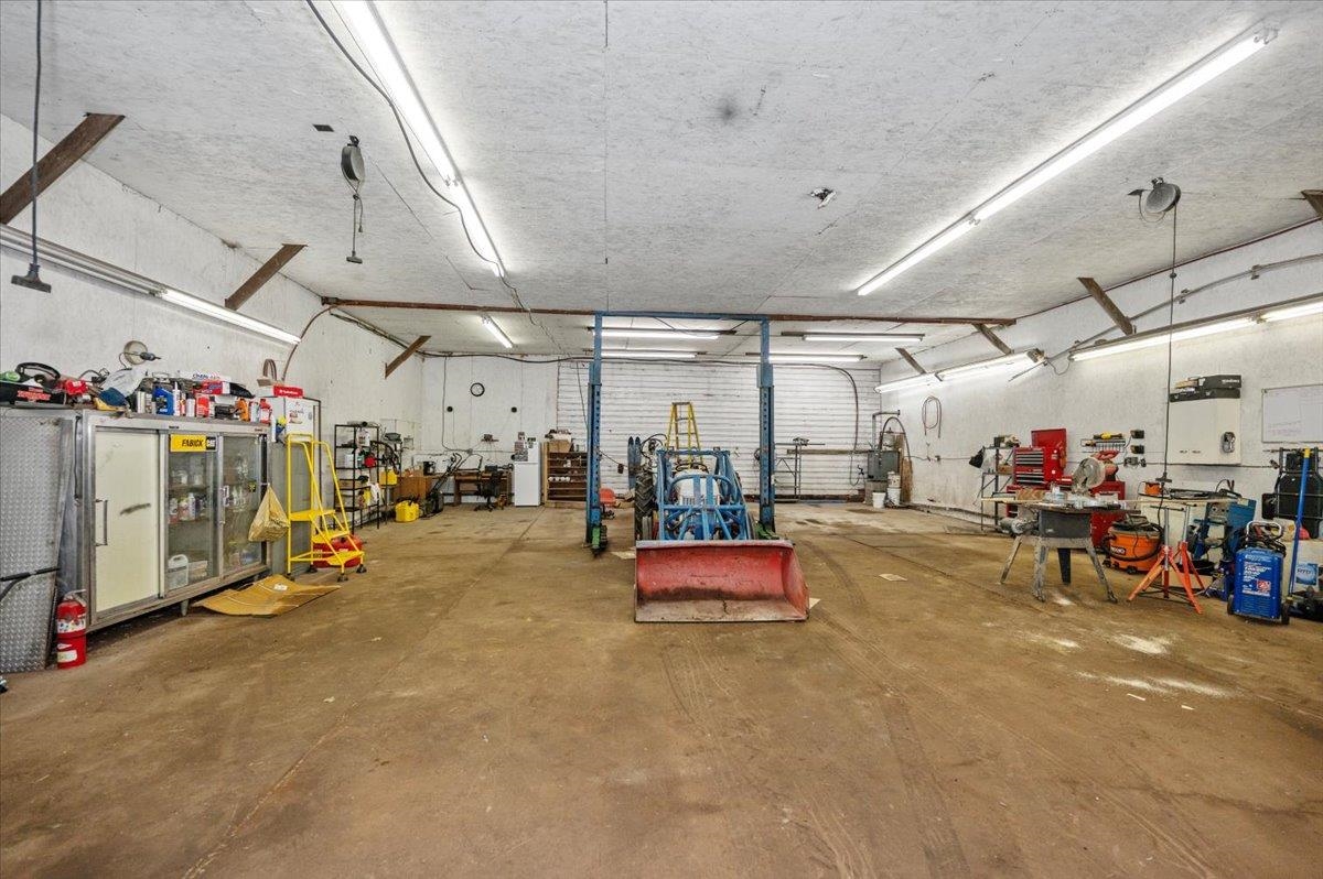 2397 Peterson Road Poplar, WI 54864 - Photo 18 of 26 40x40 Heated Workshop with Lift